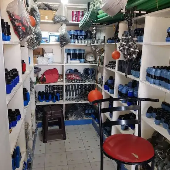 Shelves stocked with irrigation fittings and components